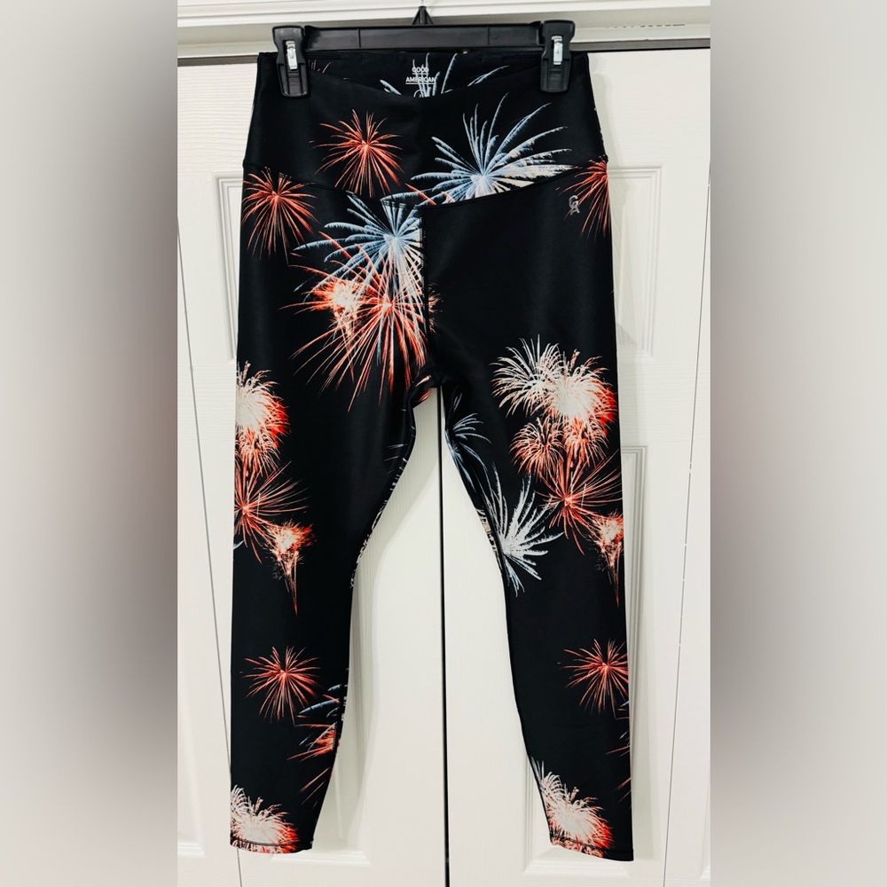 Black leggings with red, white, and blue fireworks